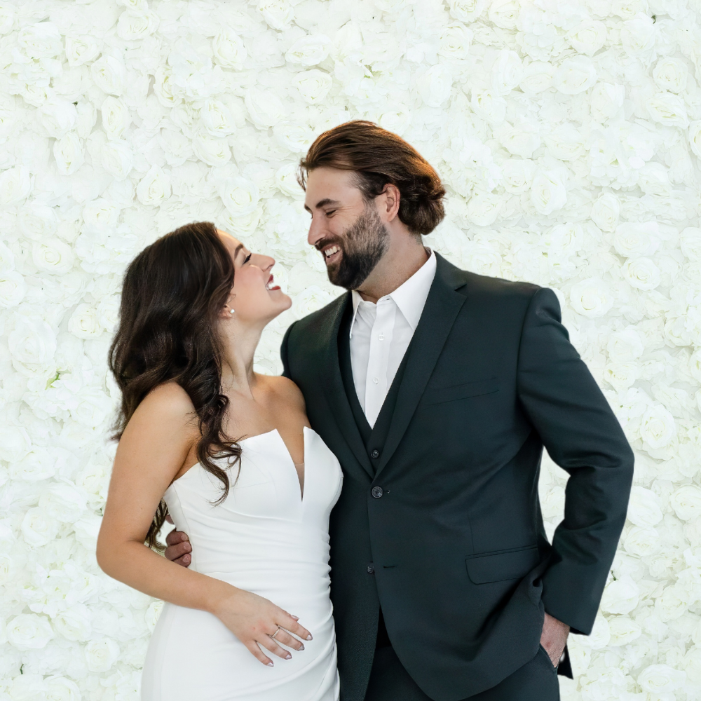 white flower wall photo booth backdrop