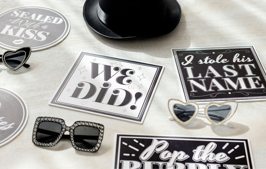 wedding photo booth prop signs and heart glasses